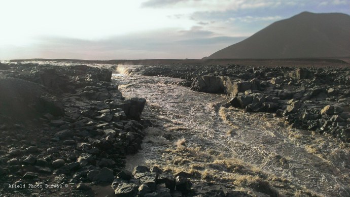 The river is so much angrier in this stretch - thankfully there was a bridge.