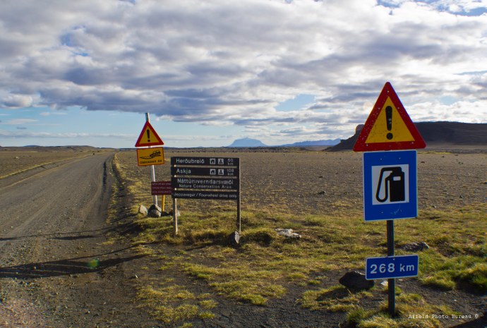 Rather ominous road signs at the entrance to F-88. The mountain way off in the distance was approximately halfway to our destination.