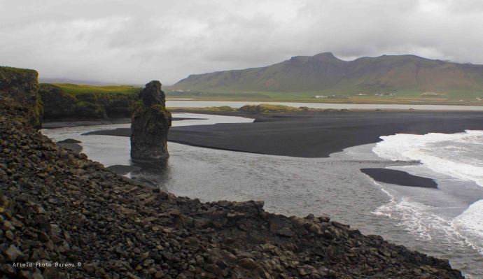 View of the black sand beach looking east.