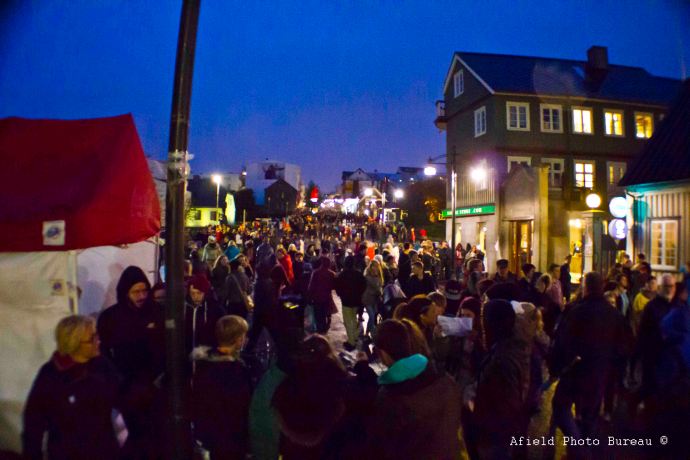 Just a few people walking up and down Laugavegur, the main shopping, eating , and drinking street.