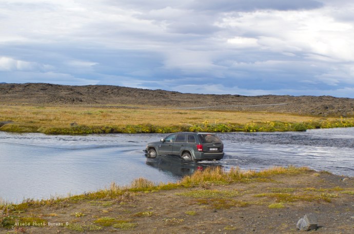 One of the few vehicle we met along the way - we had just crossed the river and noticed a little water coming in the doors.